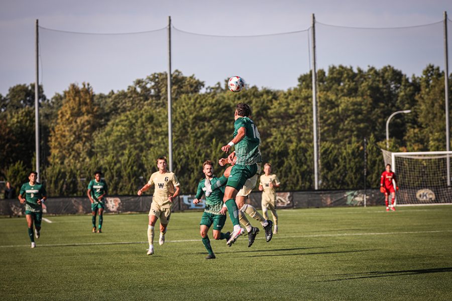 Freshman defender Alejandro Padilla heads the ball against the Broncos on Sept. 24, 2021 at the WMU Soccer Complex. The Hornets have allowed one goal or fewer in four straight matches.