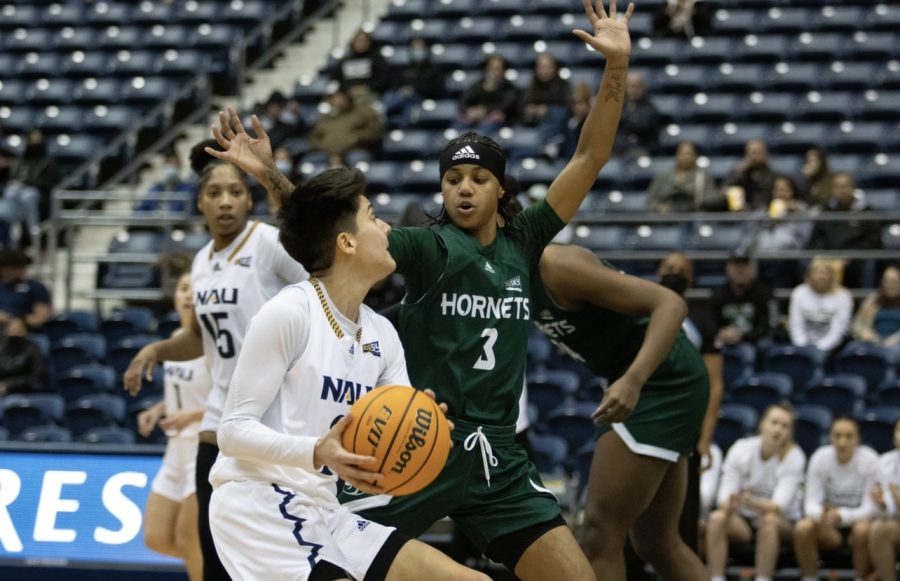 Graduate guard Lianna Tillman defends a Northern Arizona player driving to the rim Thursday, Feb. 3rd, 2022 in Flagstaff, Arizona. Tillman finished with 19 points and 9 assists in Thursday’s 76-62 win over the Lumberjacks.