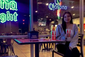 Stephanie Cornejo, a third-year communications major at Sac State sits outside of El Favorito Taqueria on Oct. 3, 2022. Cornejo says she enjoys sitting in the patio area while sipping on an an agua fresca. 